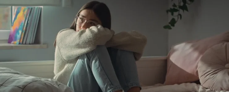 A depressed young woman with a mental health issue who needs comprehensive treatment for fatigue, overthinking, intrusive thoughts, depression, and other mental health disorders.